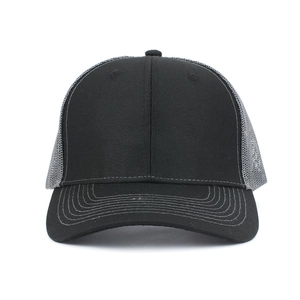 Close-up of Richardson 112 trucker hat showing black cotton twill and grey mesh detail