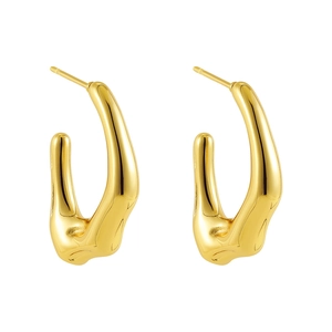 Macro detail showing the irregular lava texture and 18k gold plating of C-shaped earrings
