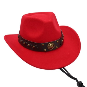 Detail of red cowboy hat with leather band, metal studs and adjustable drawstring
