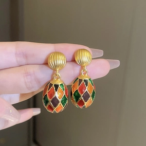 Vintage gold oval earrings with colorful enamel diamond pattern in French retro style