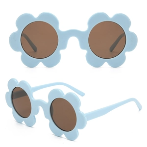 Detailed view of light blue flower-shaped sunglasses with brown lenses from multiple angles