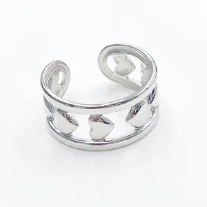 Minimalist silver stainless steel open ring featuring a hollow heart pattern design