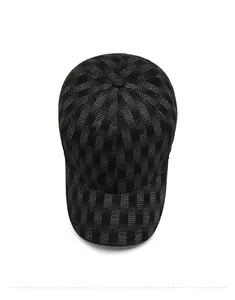 Top view of baseball cap featuring black and gray checkered pattern and fabric texture