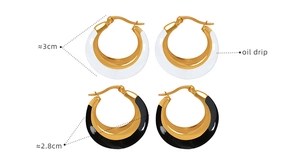 Detail view of black and white oil drip hoop earrings with gold trim and size specs