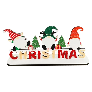 Detail of wooden Christmas gnomes on a stand with 3D CHRISTMAS lettering and mini gift box