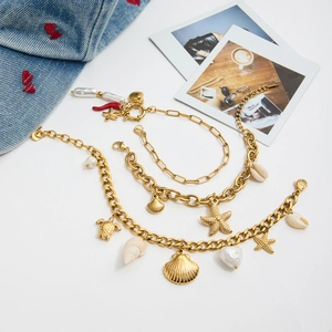 18K gold plated stainless steel bracelet set with sea shells, starfish and pearls