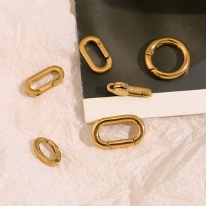 Macro shot of 18K gold plated stainless steel spring clasps for jewelry and bag accessories