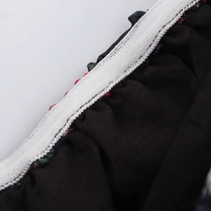 Schulterfreies Mini-Top aus Organza in Schwarz mit Blumenmuster und elastischem Saum