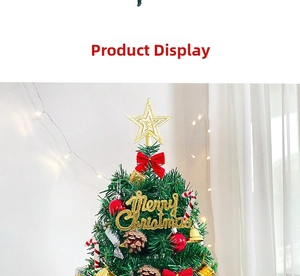 Close-up of 50cm tabletop Christmas tree with golden star and festive red ornaments