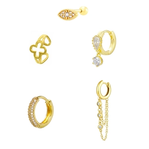 Detailed view of gold-plated earring set with zircon inlays and clover design