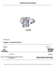 Macro detail of silver ring featuring gradient blue purple zircon and open double band
