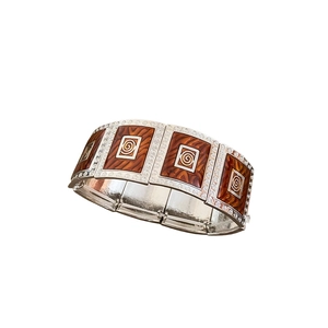 Elastic wide metal bracelet with brown enamel panels and vintage spiral patterns