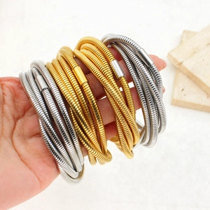 Minimalist 18K gold and silver plated stainless steel spring bangles in stacked style