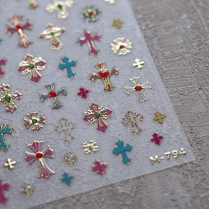 Frosted cross nail art stickers with gold foil edges and colorful designs, model M-794
