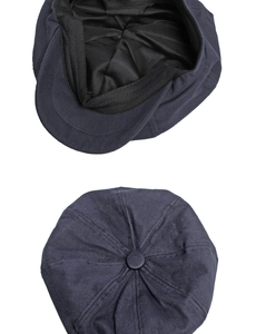 Detailed inner lining and top view of the navy blue eight-panel cotton newsboy cap