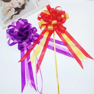 Two-tone sphere pull bows for wedding cars and gift wrapping on white background