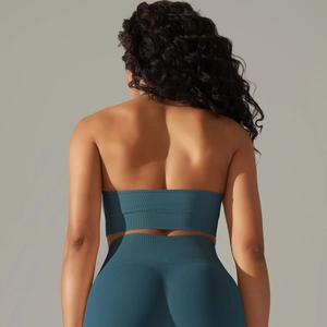 Deep peacock blue ribbed seamless yoga set showing back detail and high waist fit