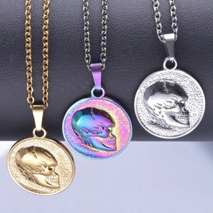 Three round skull relief pendants in gold, silver, and iridescent steel finishes