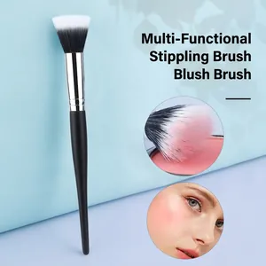 Pinceau blush stippling avec manche noir et fibres bicolores pour maquillage parfait