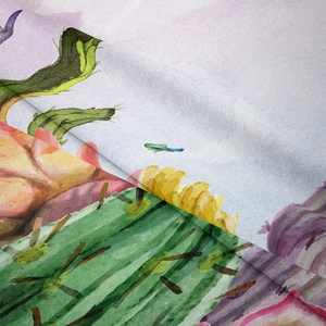 Close-up of bohemian tapestry fabric showing watercolor cactus prints and twill texture