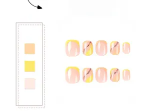 Short round press-on nails with orange-pink, bright yellow and glitter line accents