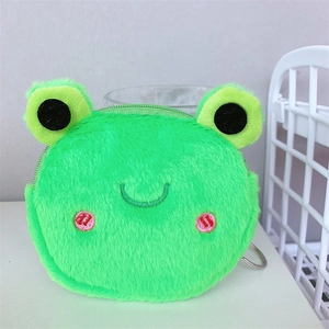 Close-up of a green plush frog coin purse with 3D eyes and metal keychain attachment