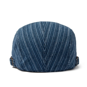 Rear view of vintage blue striped denim ivy cap with adjustable metal side buckles