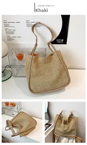 Detailed close-up of khaki woven straw tote bag with premium synthetic leather trim