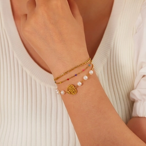 Three-layer gold stainless steel bracelet with pearls, colorful beads and heart pendant