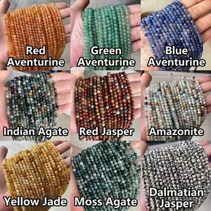 Collection of nine colorful natural gemstone beads including aventurine and agate stones