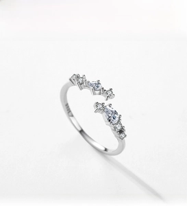 Macro shot of S925 sterling silver ring with pear-cut cubic zirconia and S925 hallmark