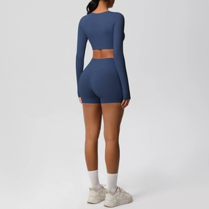 Detail view of high-elasticity dark blue yoga set showing rear seam and fabric texture