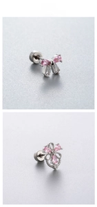 Detailed tile display of pink zircon bow and heart earrings with silver steel finish