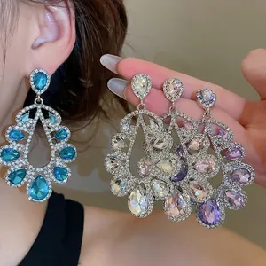 Elegant silver waterdrop earrings with colorful crystals in a bohemian hollow design