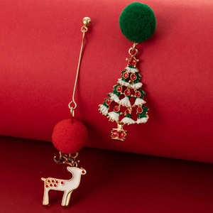 Detailed view of asymmetric Christmas earrings with gold reindeer, tree and soft pom-poms