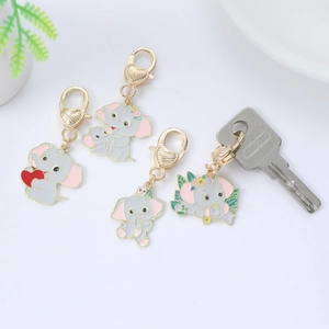 Cute enamel elephant keychain set with gold plating and lobster clasp on white background