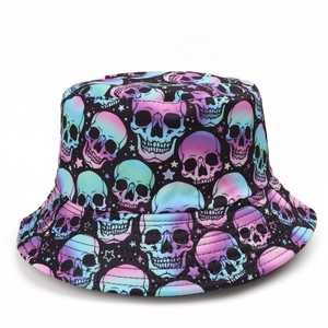 Detail of double-sided bucket hat featuring vibrant skull and star print on black fabric