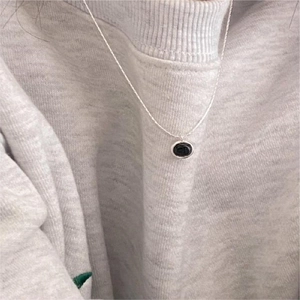 Minimalist 925 sterling silver necklace featuring a black oval onyx pendant for women