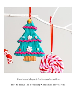 Close-up of clay Christmas tree and candy cane ornaments with red hanging silk ribbons