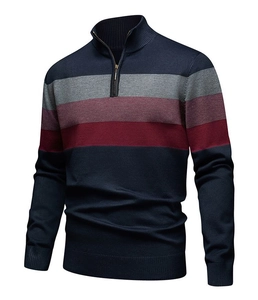 Detail of navy slim fit knit sweater showing multi-color stripes and ribbed cuffs