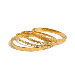 18K gold plated bangle set with heart and butterfly charms and sparkling cubic zirconia