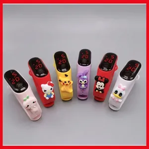 Detail view of colorful LED silicone watches featuring various cute cartoon character bands