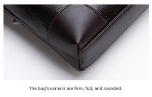 Close-up of reinforced bag corners in dark brown lychee leather with smooth stitching