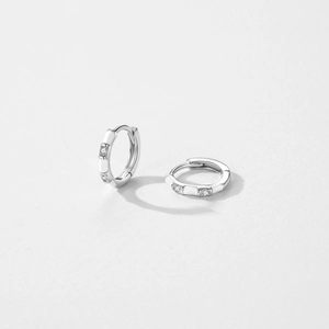 Elegant S925 sterling silver huggie earrings with white enamel and cubic zirconia stones