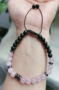 Handmade Mother Daughter Morse code bracelet with pink crystal beads on female wrist