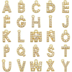 Detailed grid of gold-plated alphabet pendants with sparkling zircon stone settings