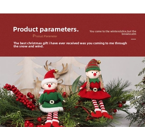 Detail of cute Christmas elf doll ornaments with striped legs and golden bells on wreath
