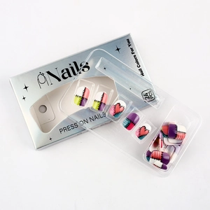 Detailed set of 24 colorful press-on nails with heart patterns in silver metallic box