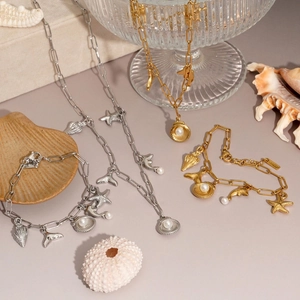 Marine themed stainless steel necklaces and bracelets with starfish shell and pearl charms