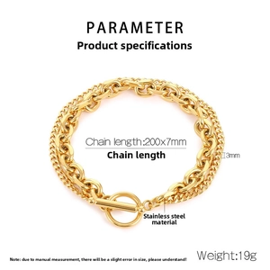 Detail of gold-plated stainless steel double-layered Cuban bracelet with OT toggle clasp